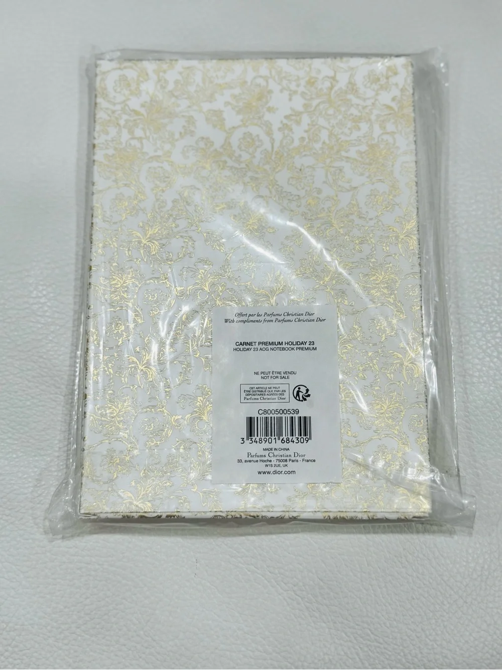 Dior White and Gold Embossed Floral Notebook Phone Case